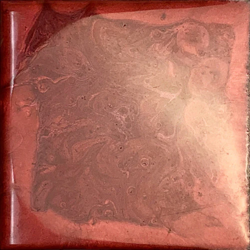 Pearl Red metallic floor color swatch